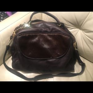 IMAN butter soft leather traveler.